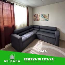 Living room featuring L-shaped sofa and tiled floor in Residencial Palo Alto Penonomé
