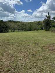 Large open grassy buildable lot with natural landscape views near Coronado Panama