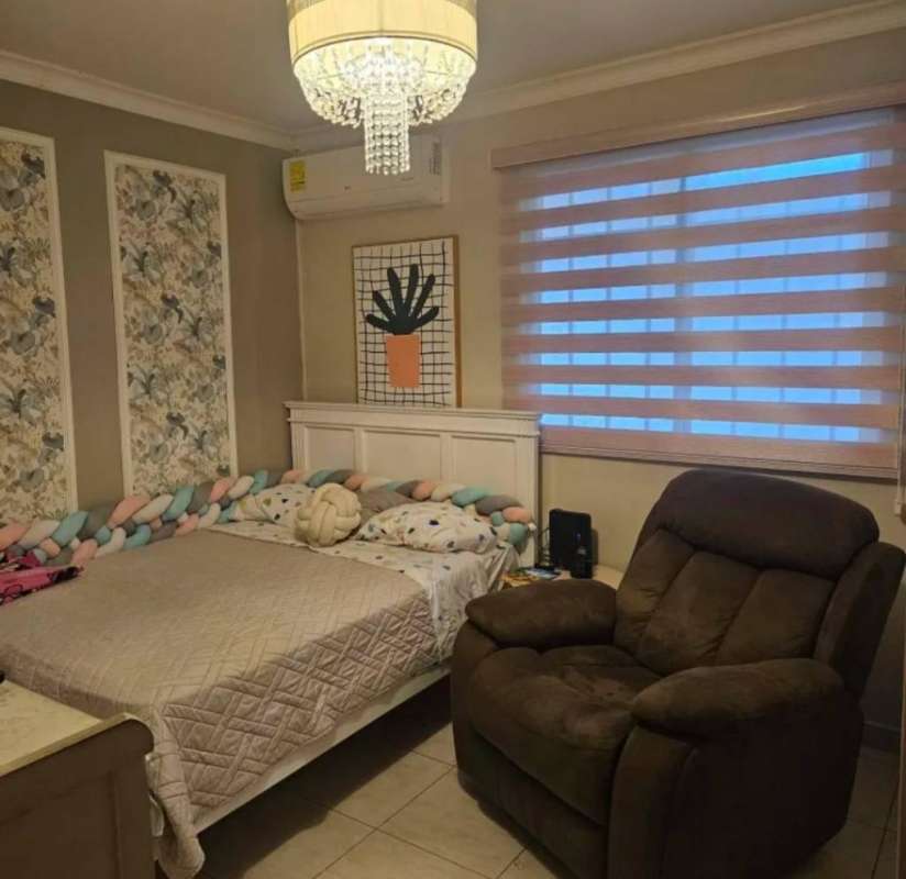 Modern kitchen with granite countertops and cabinets in Villa Lucre Panama