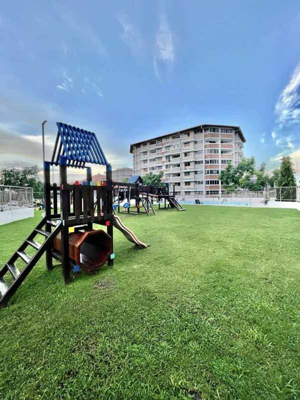 Secure playground structures and garden view at Residencial Llano Bonito Panama
