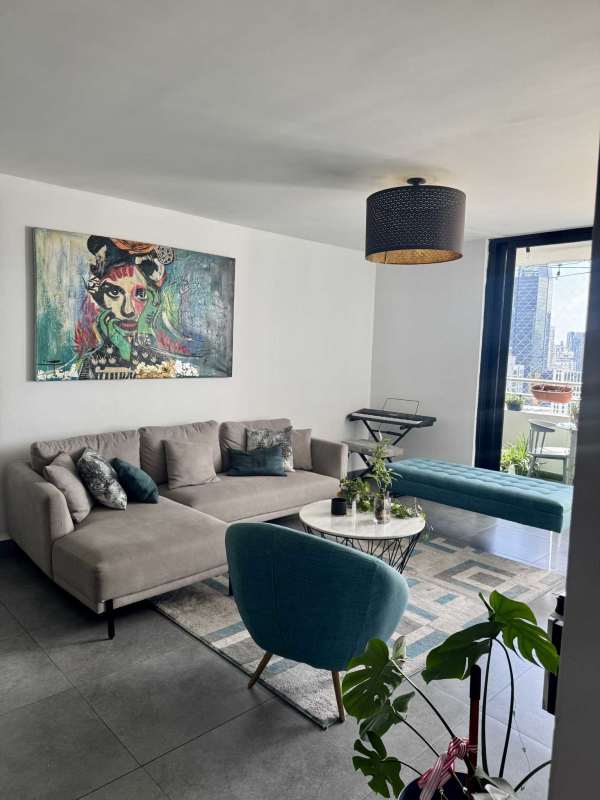 Fully equipped modern kitchen with granite countertops, open layout, and ample cabinetry in PH Obarrio Residence.