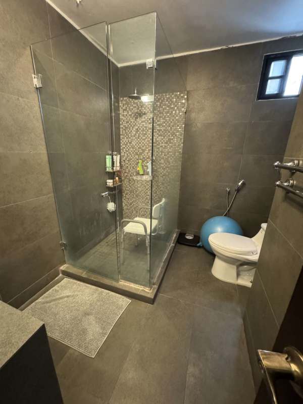 Secondary bedroom with large window and closet in PH Obarrio Residence Obarrio Panama City.