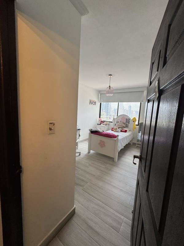 Master bedroom with city skyline view, walk-in closet, split AC in PH Obarrio Residence Obarrio Panama City.
