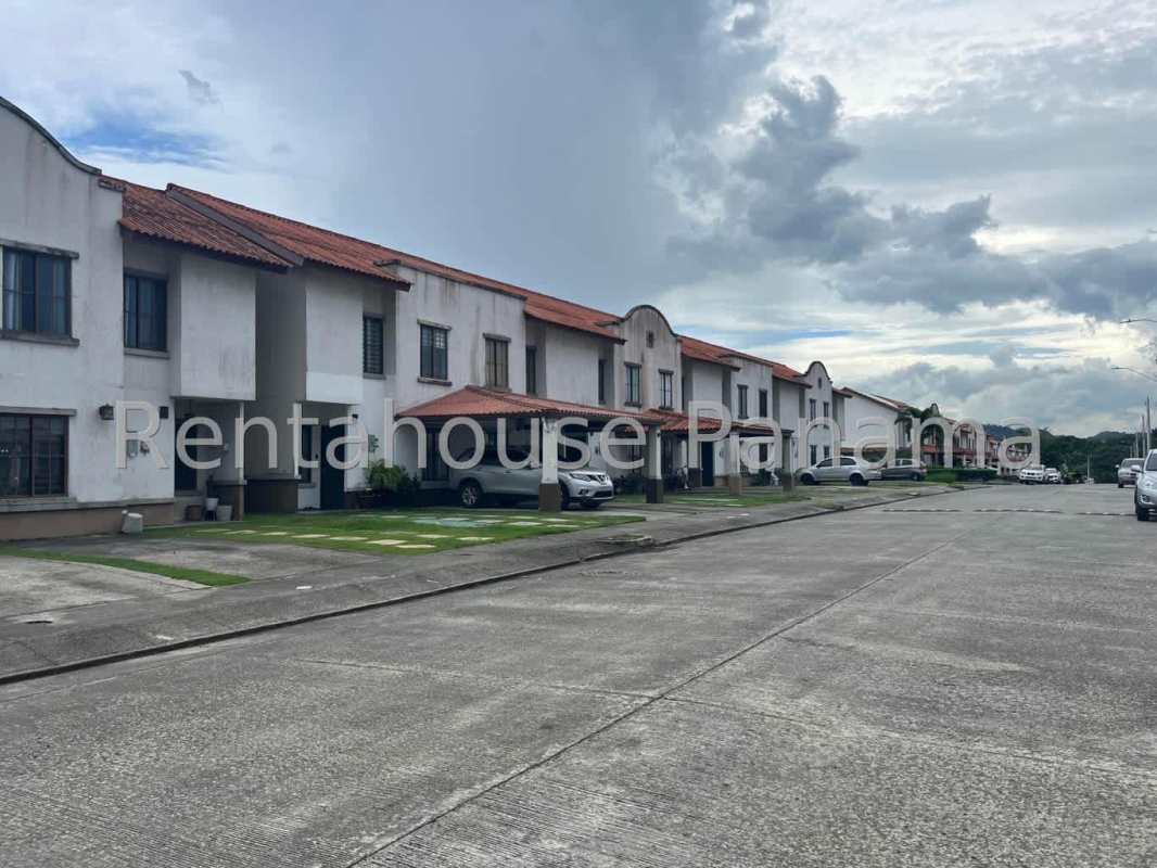 Mediterranean style townhouses with red tiled roofs in Villa Zaita