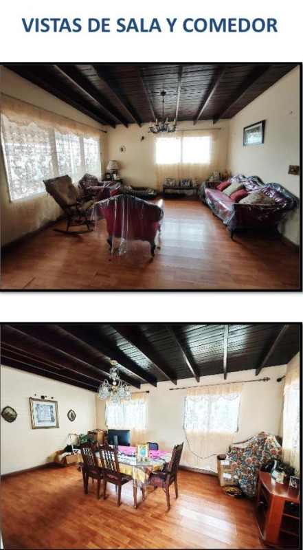 Spacious traditional living dining room with wooden ceilings and chandelier lighting Villa Cáceres La Alameda