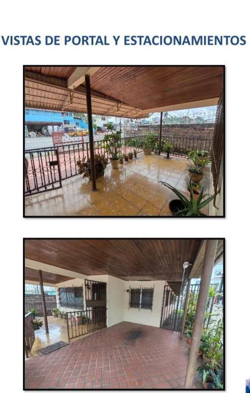 Covered porch and parking within fenced yard of Villa Cáceres house Panama City Panama