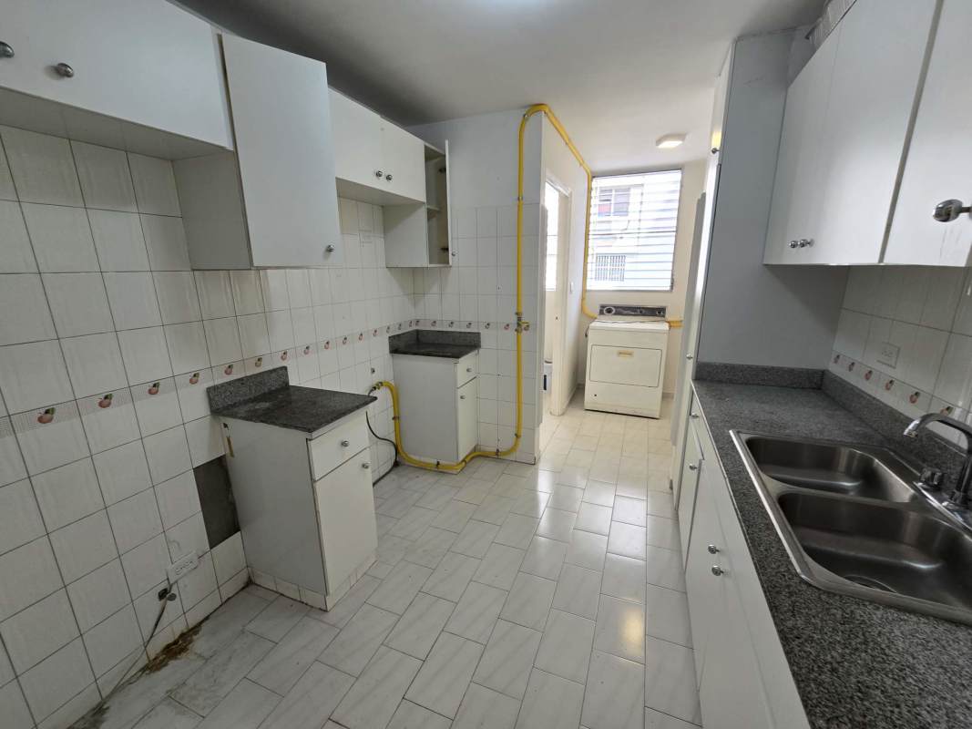 Kitchen with granite counters, cabinets and laundry space PH Ocean View Panama