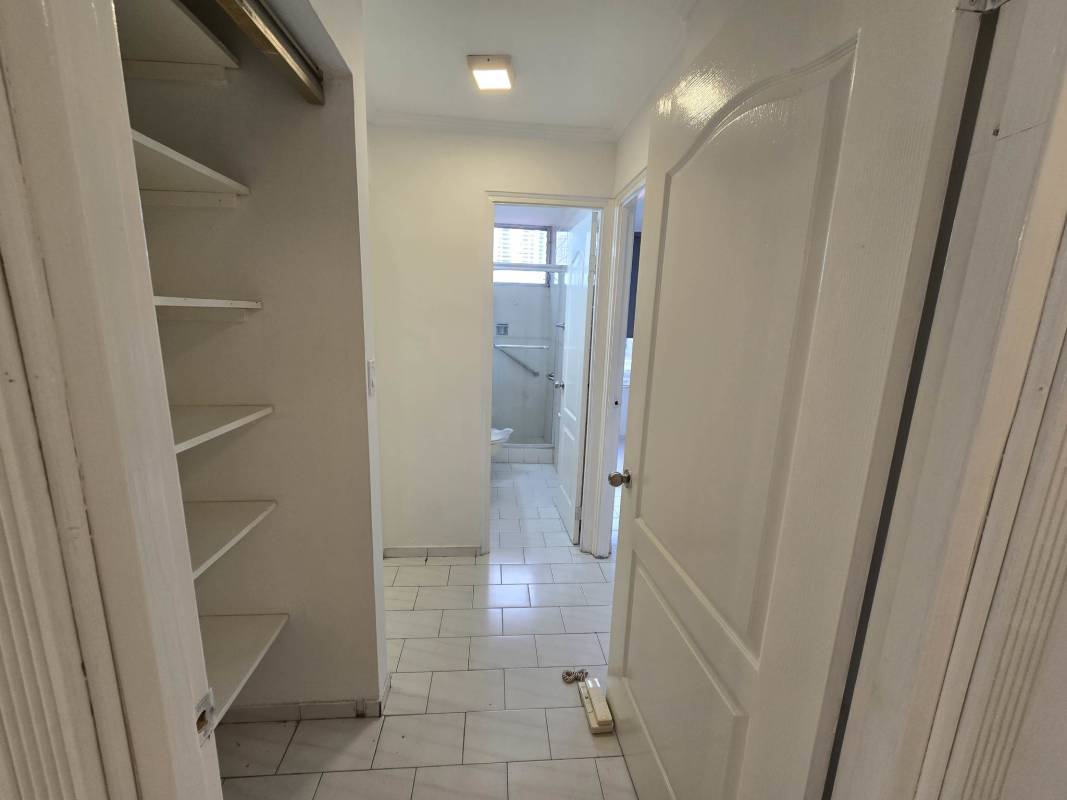 Laundry utility room with sink and heater PH Ocean View apartment rental Panama