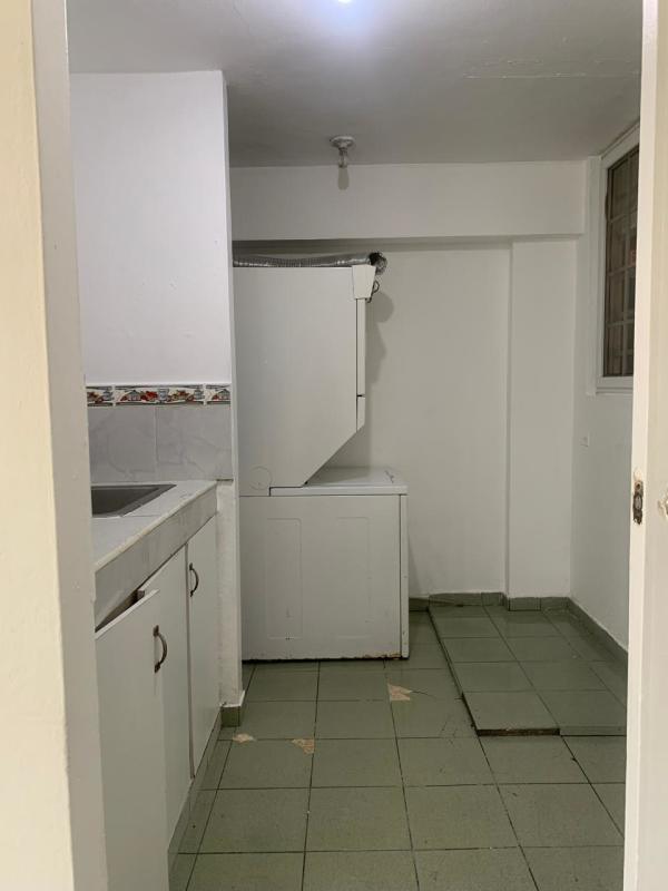 Laundry space tiled with washer hookup rent apartment San Pedro Multiverde Panama