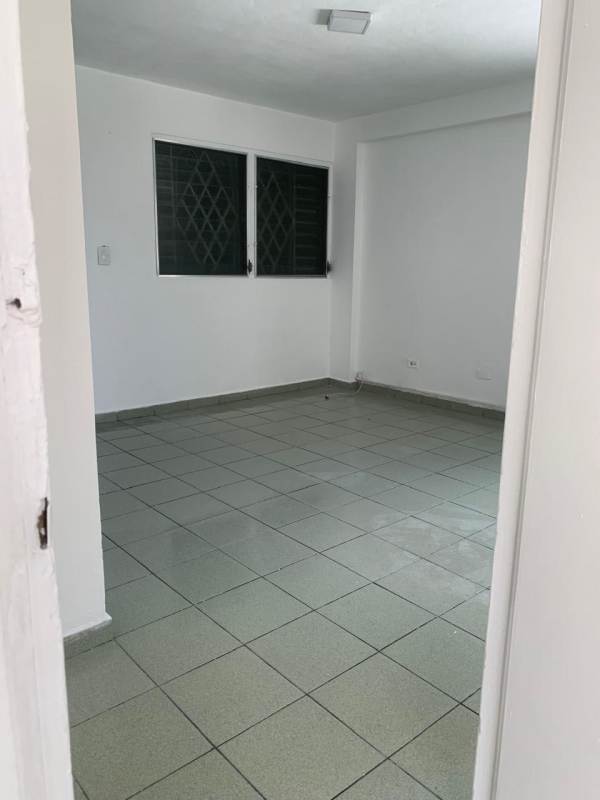 Empty room tiled floor windows security bars apartment rent Panama