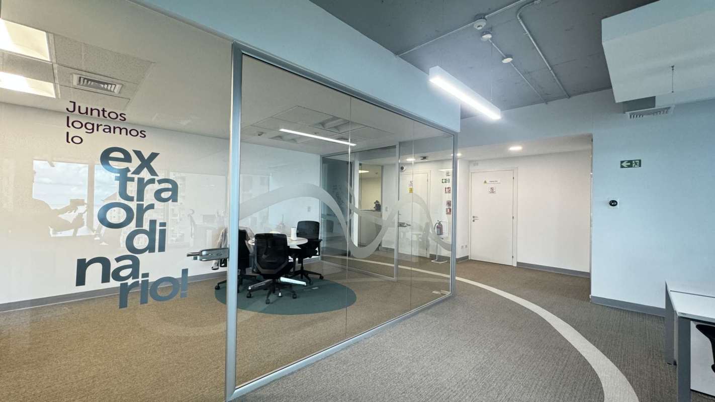 Open-plan commercial office with floor-to-ceiling windows at Oceania Business Plaza Panama City