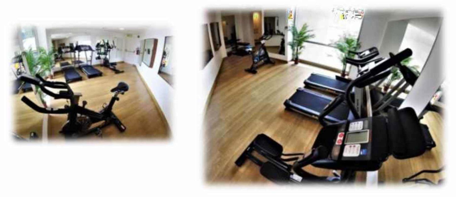 Modern gym with mirrors, exercise machines, natural light at Costa del Este Financial Park Panama