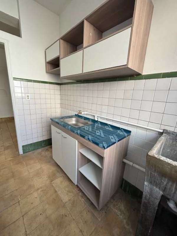 Spacious closet with open door and tiled flooring in Perejil apartment Panama City