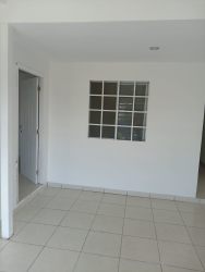 Basic kitchen with tile backsplash and countertop in Valle San Bernardino house