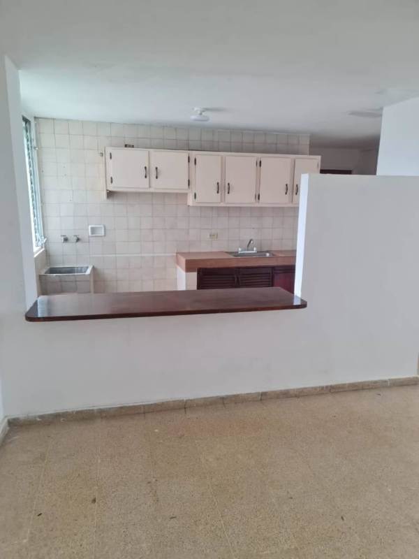 Entrance door with metal security gate in PH Octubre Plaza Hato Pintado Panama City