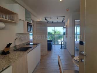 Modern kitchen with granite countertops dining area Playa Caracol Punta Chame Panama