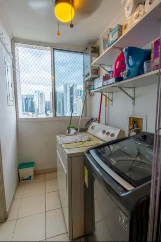 Dedicated laundry area with large window overlooking city PH Via Argentina El Cangrejo Panama
