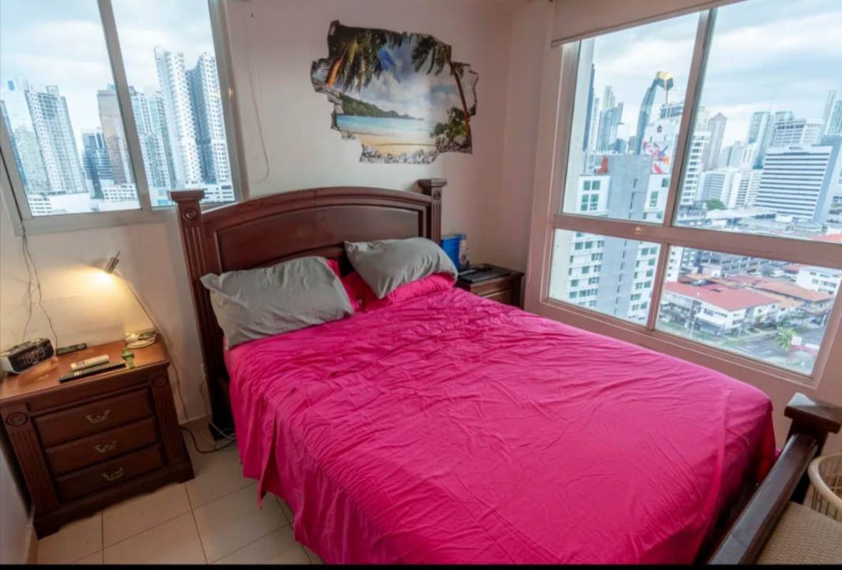 Bedroom with large window overlooking Panama City skyline PH Via Argentina El Cangrejo