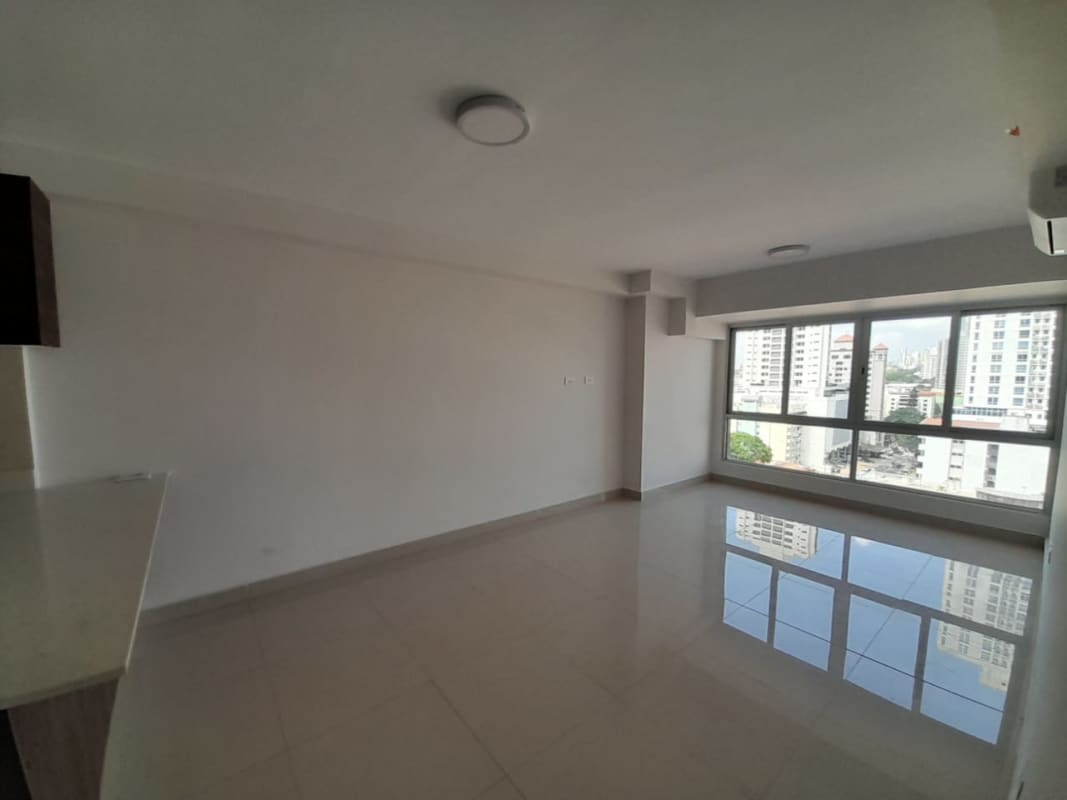 Spacious master bedroom with large window city view Panama apartment rent