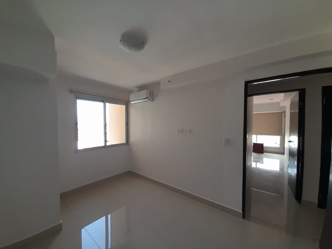 Bright living room with balcony access and city view PH El Carmen 360 Panama