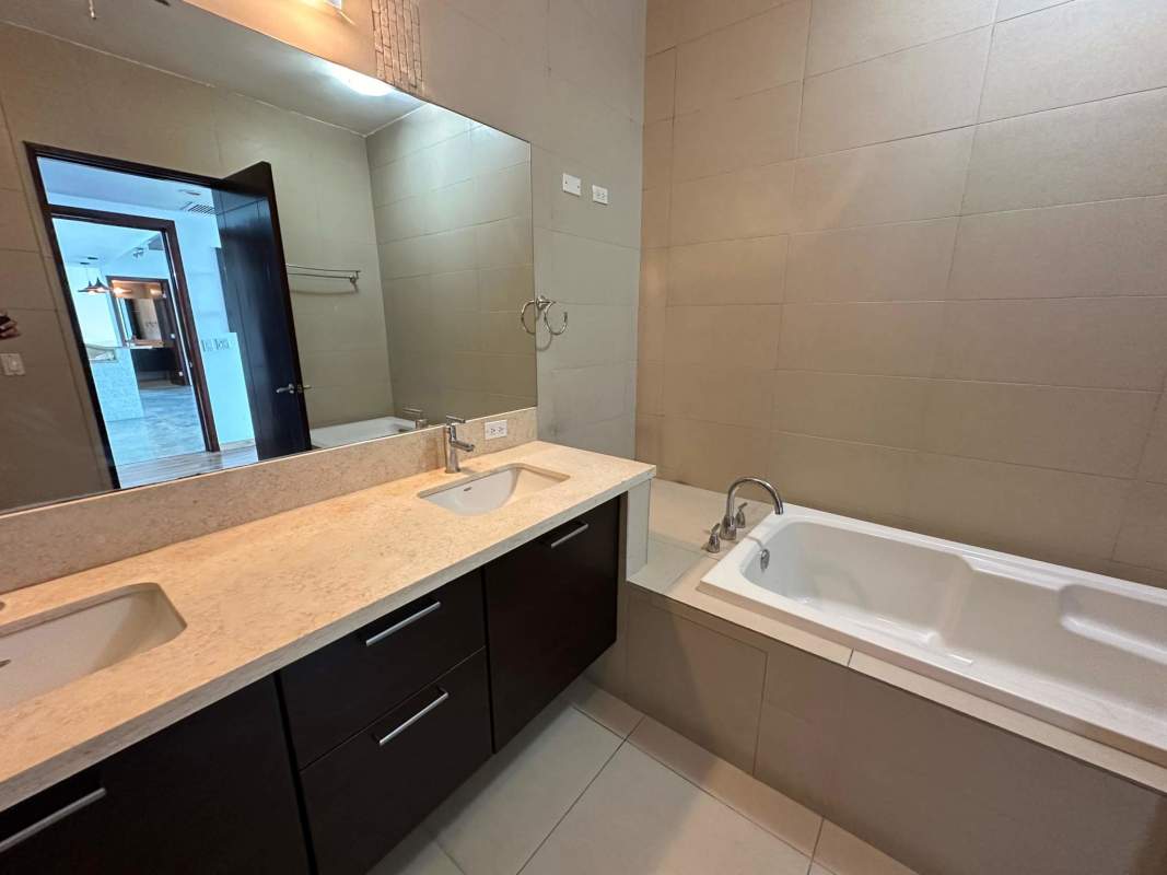 Contemporary bathroom with double vanity and bathtub at PH Dupont Tower Panama City
