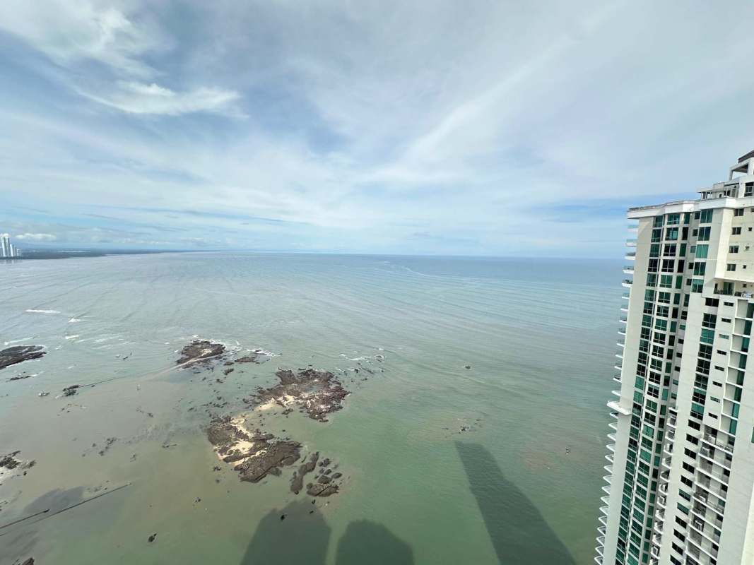 Panoramic coastal view from PH Dupont high-rise apartment overlooking ocean
