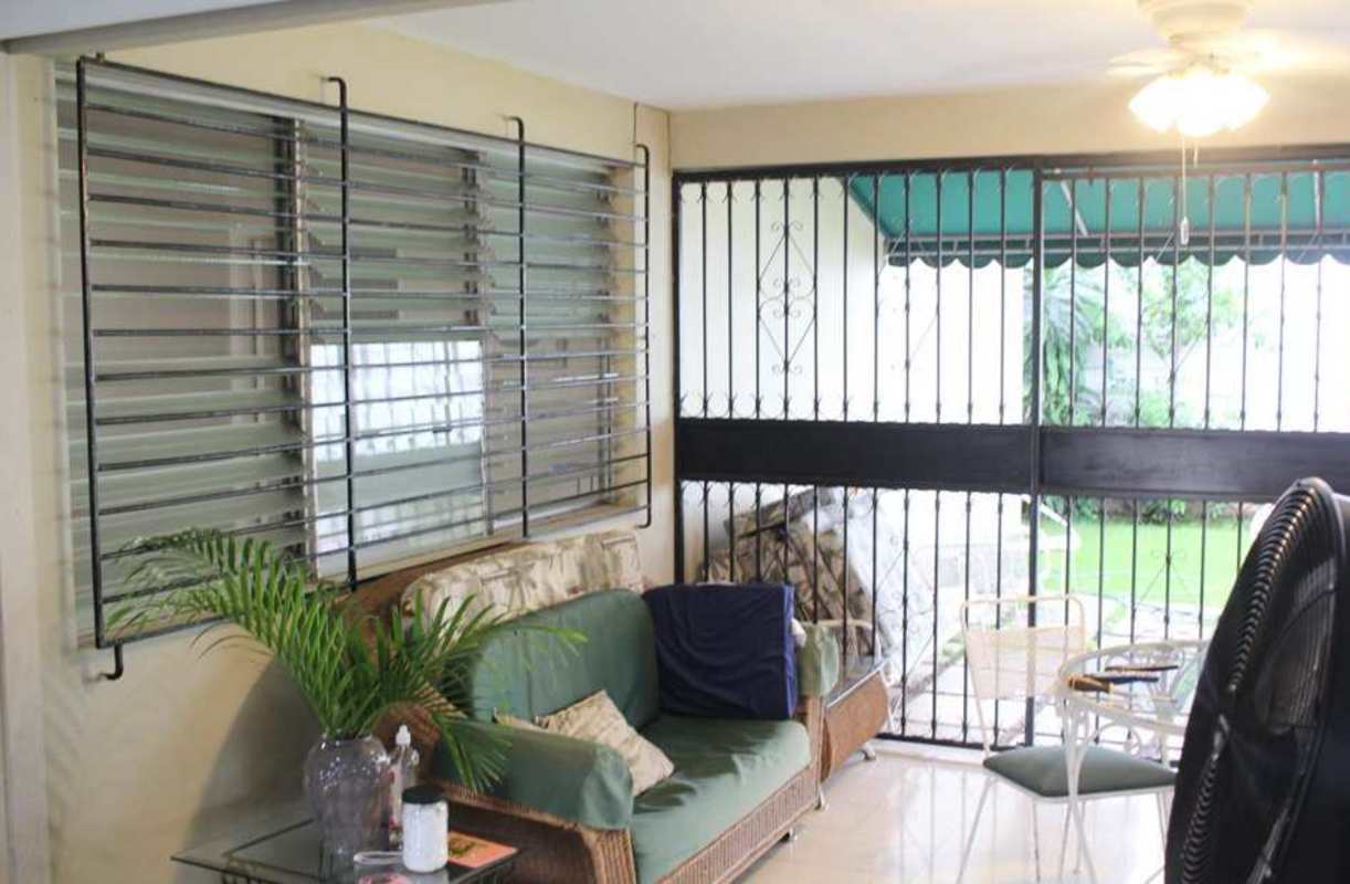 Kitchen with cabinetry appliances garden window in house for sale San Francisco Panama