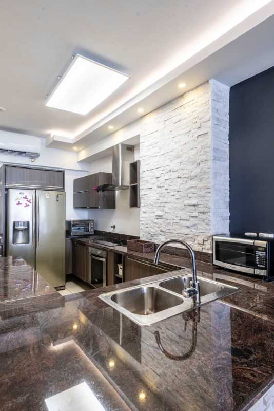 Dining space with floor-to-ceiling windows and ocean panoramas at PH Rivage Tower