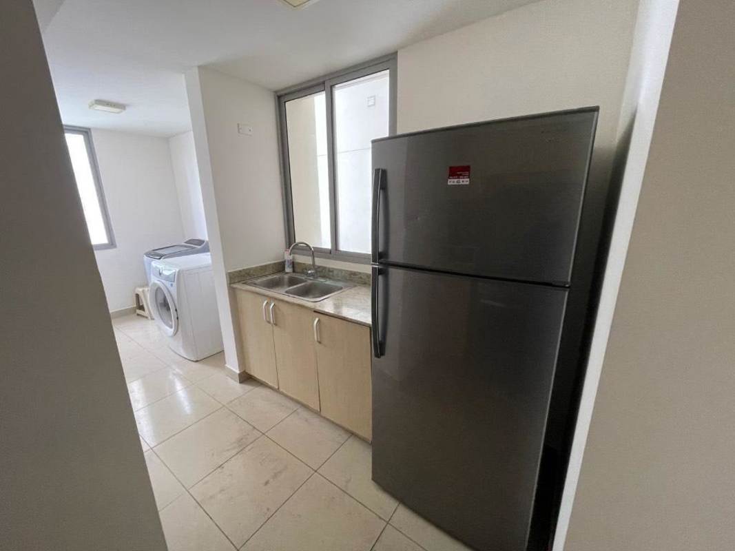 Dedicated laundry area with washer dryer in PH Rokas apartment Panama City
