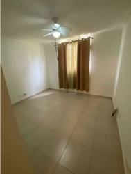 Bright bedroom with ceramic tile floors, window, ceiling fan in Las Olas Playa Dorada Panama