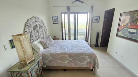 Master bedroom with private balcony access ocean views Vistamar Golf Marina Panama