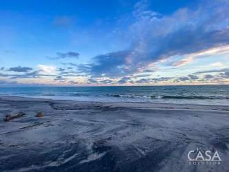 Aerial view of beachfront parcel 900m2 with unobstructed ocean vista in Juan Hombrón, Panama