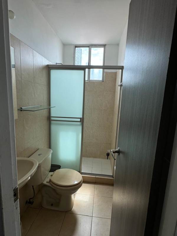 Bright bedroom with large wardrobe and blinds at PH Barcelona View Carrasquilla Panama City