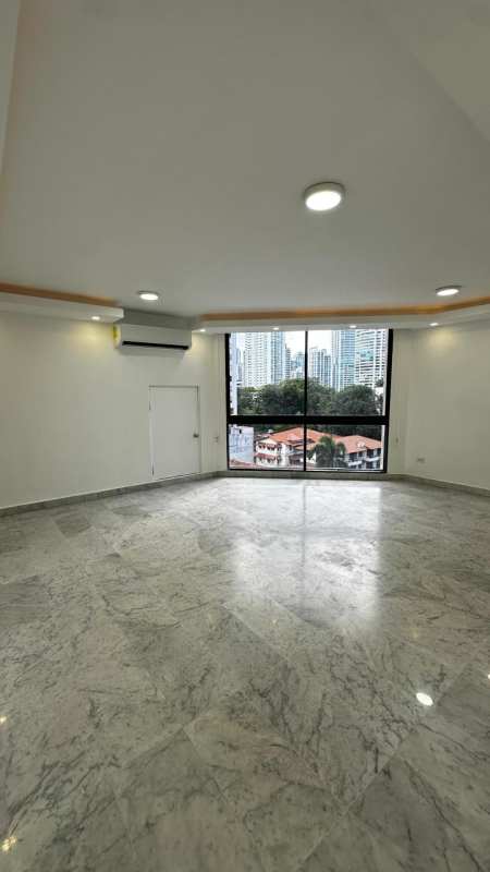 Spacious living and dining room with large windows and ocean skylines in PH Villa del Mar Bella Vista