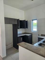 Granite countertop kitchen with backsplash, cabinetry in PH Napa Village Playa Blanca