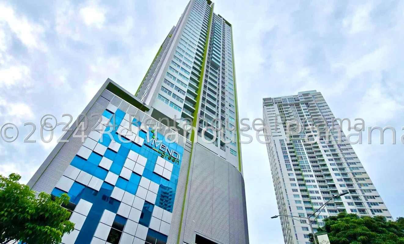 Bright modern living room with sliding glass doors opening to balcony in Edison Park Panama