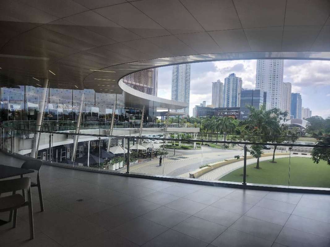 Glass balcony overlooking city skyline TownCenter Costa del Este Panama