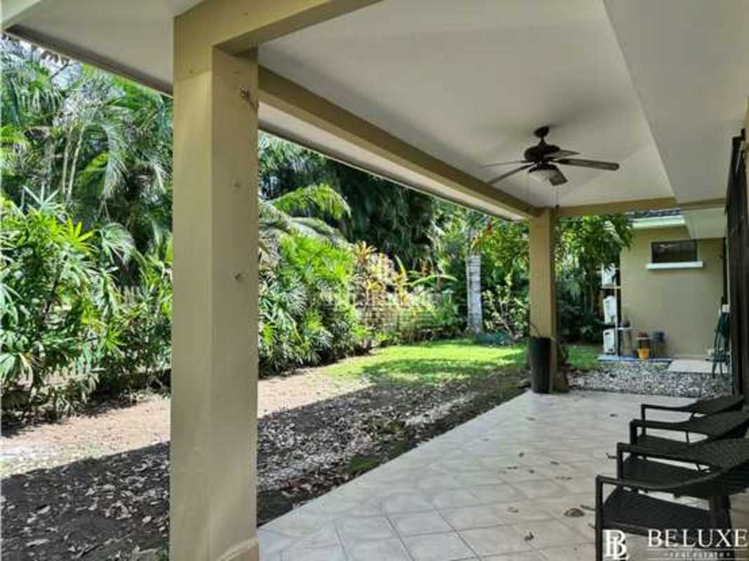 Bright spacious living room with tile flooring, natural light, in PH Embassy Garden Clayton Panama