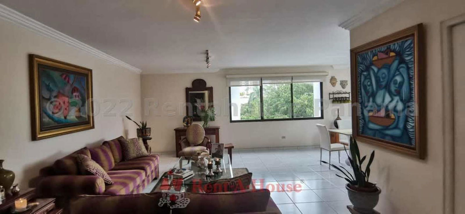 Large living and dining space with bright windows and city views in PH San Francisco, Panama