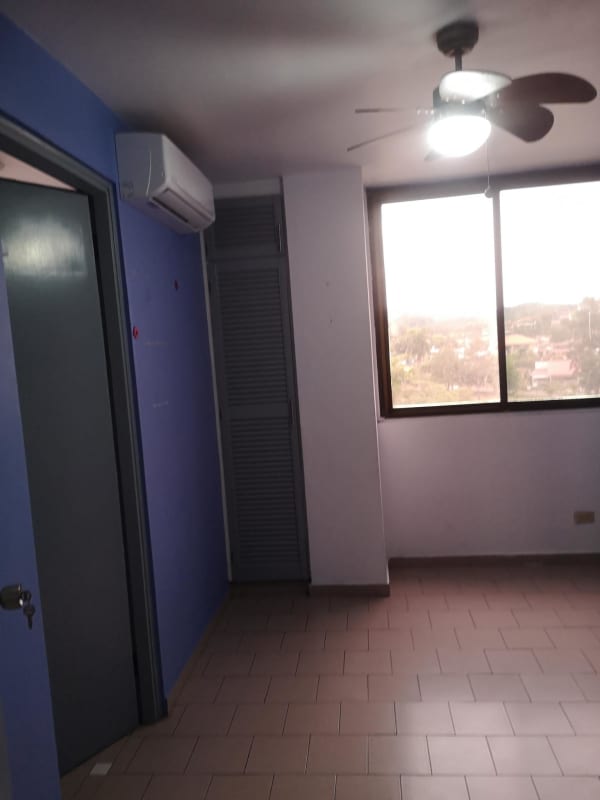 Bedroom with large window city view, AC unit PH El Dorado Panama