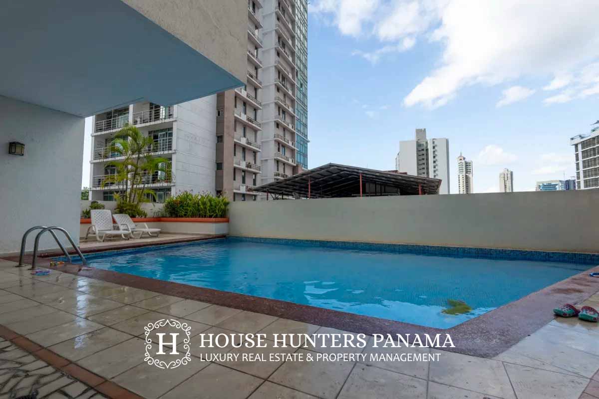 Bedroom with AC, closet and large window city view PH El Cangrejo Panama City