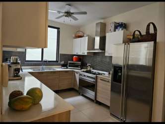Spacious kitchen stainless steel appliances cabinetry window River Valley Panama Pacifico for sale