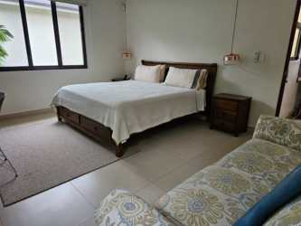 Master bedroom with large window balcony access 4 bedroom Panama Pacifico for sale Hola Realty