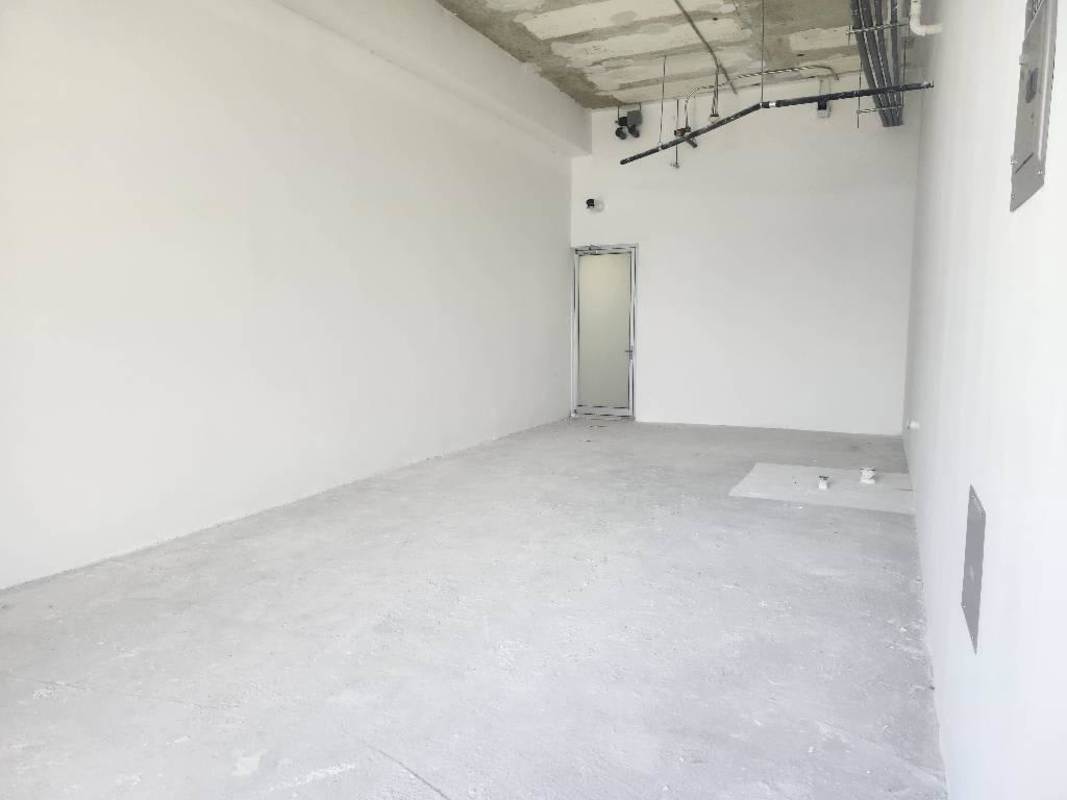 Grey shell medical office space with large window Costa del Este Town Center Panama