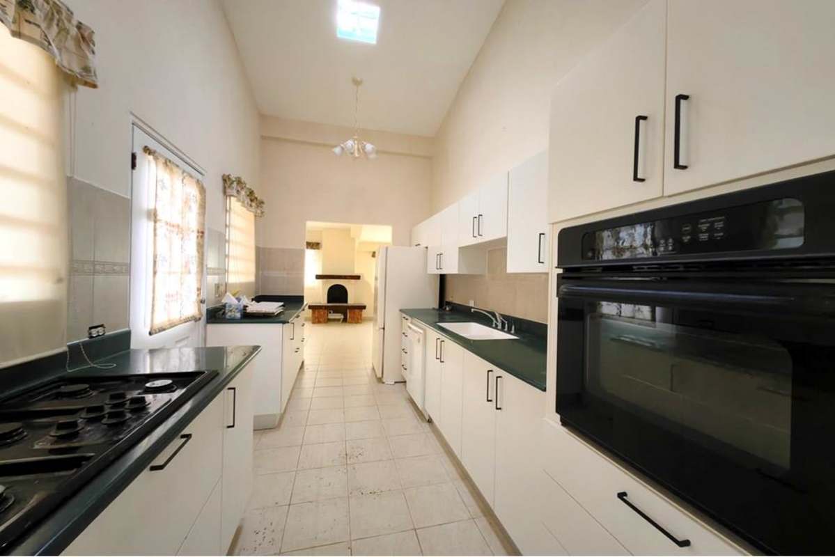 Covered terrace with stone columns and mountain surroundings Cerro Azul Panama