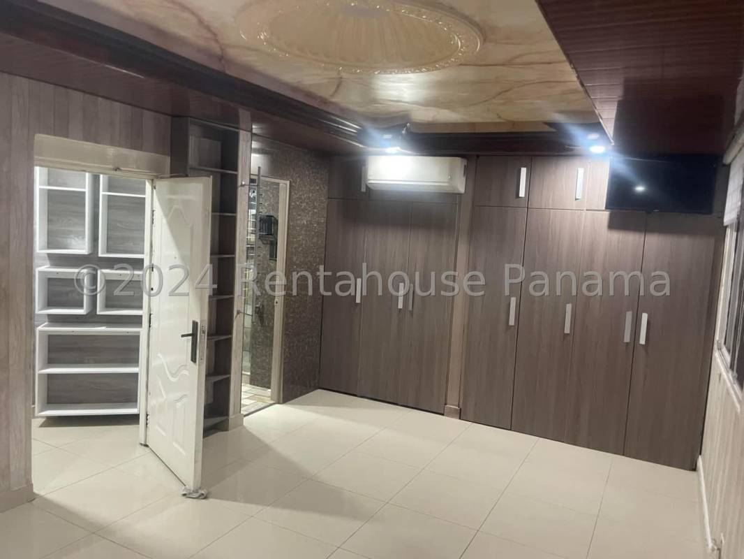 Covered terrace with panoramic residential neighborhood views in Brisas del Golf Panama