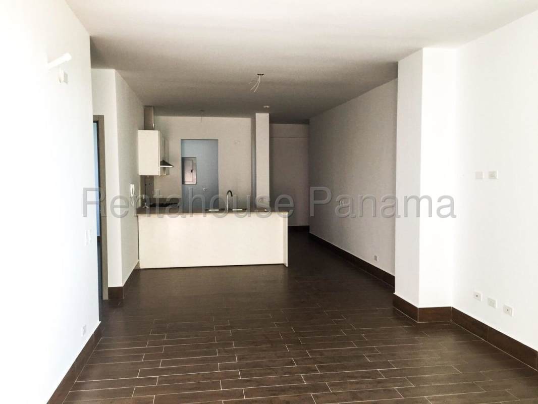 Living and dining space with balcony and natural light PH Costa Sur Garden