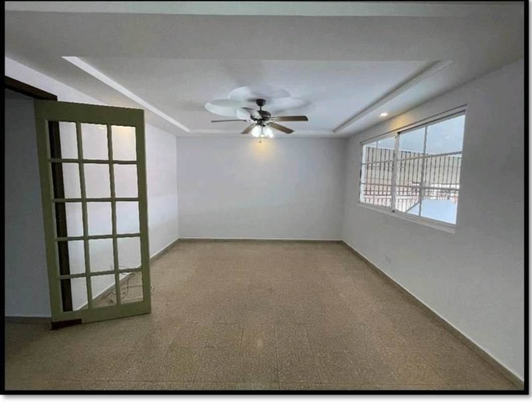 White modern multi-purpose room with light flooring and windows for sale in Cerro Viento