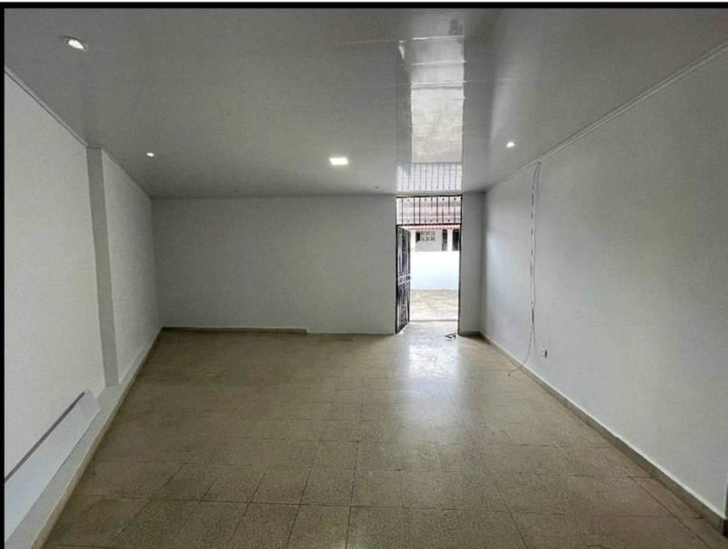 Empty living room with large window, ceiling fan, recessed ceiling at Cerro Viento Panama