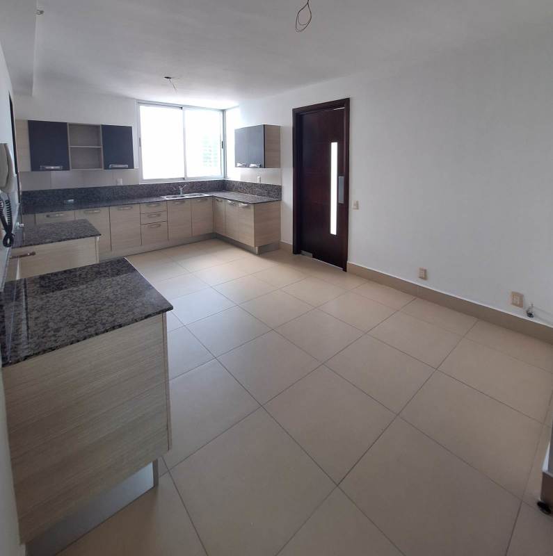 Modern spacious kitchen granite countertops natural light PH Breeze Costa del Este